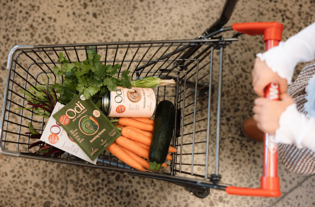 Shopping cart filled with Odi Nutrition baby food products - demonstrating what to look for in commercial baby food according to clinical nutritionists